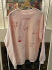 Crewneck sweatshirt featuring an all-over patchwork heart back design.
