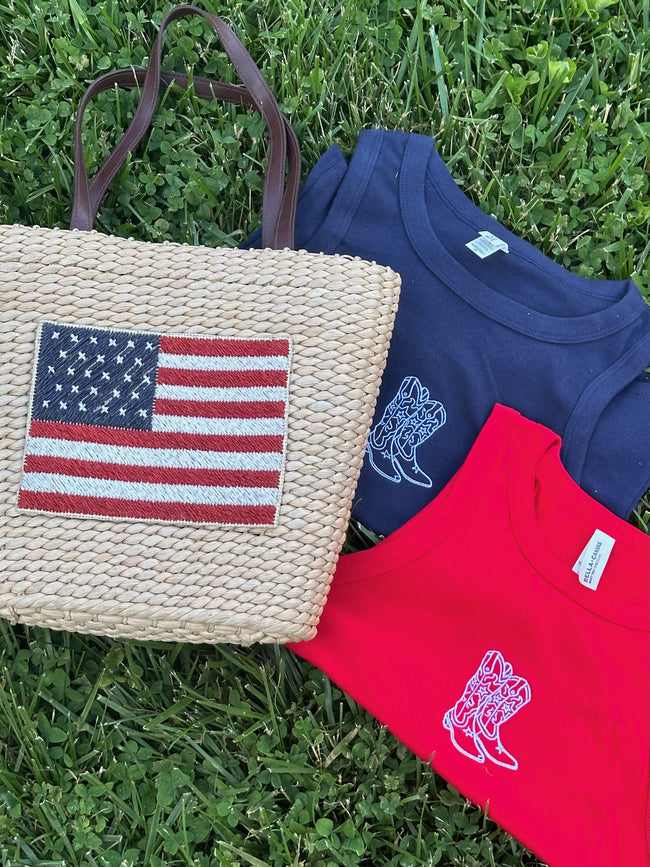 Close-up of a navy and red embroidered cowgirl boots tank featuring a western-inspired boot design.