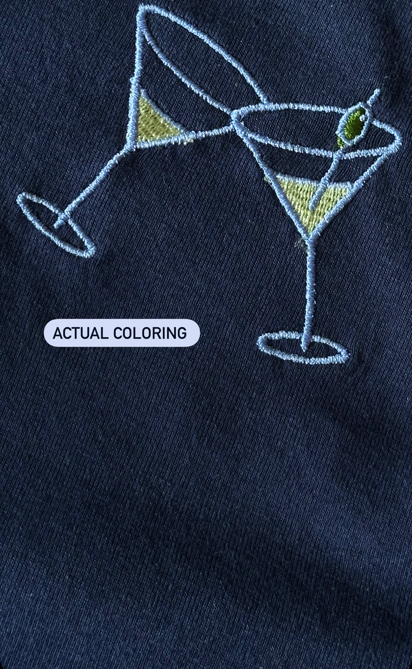 Close-up of the embroidered martini glass design on the navy Tini Tank.