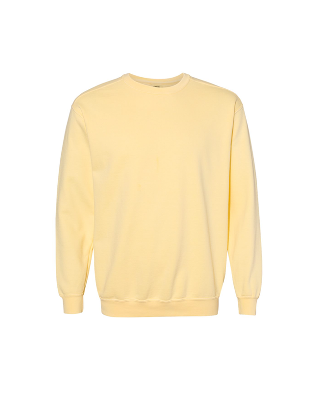 Custom last name crewneck sweatshirt in butter yellow.