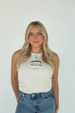 Model wearing a cream embroidered hot dog tank featuring the phrase 