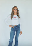 Woman wearing an Ohio Flags long sleeve tee featuring a classic Ohio flags graphic.